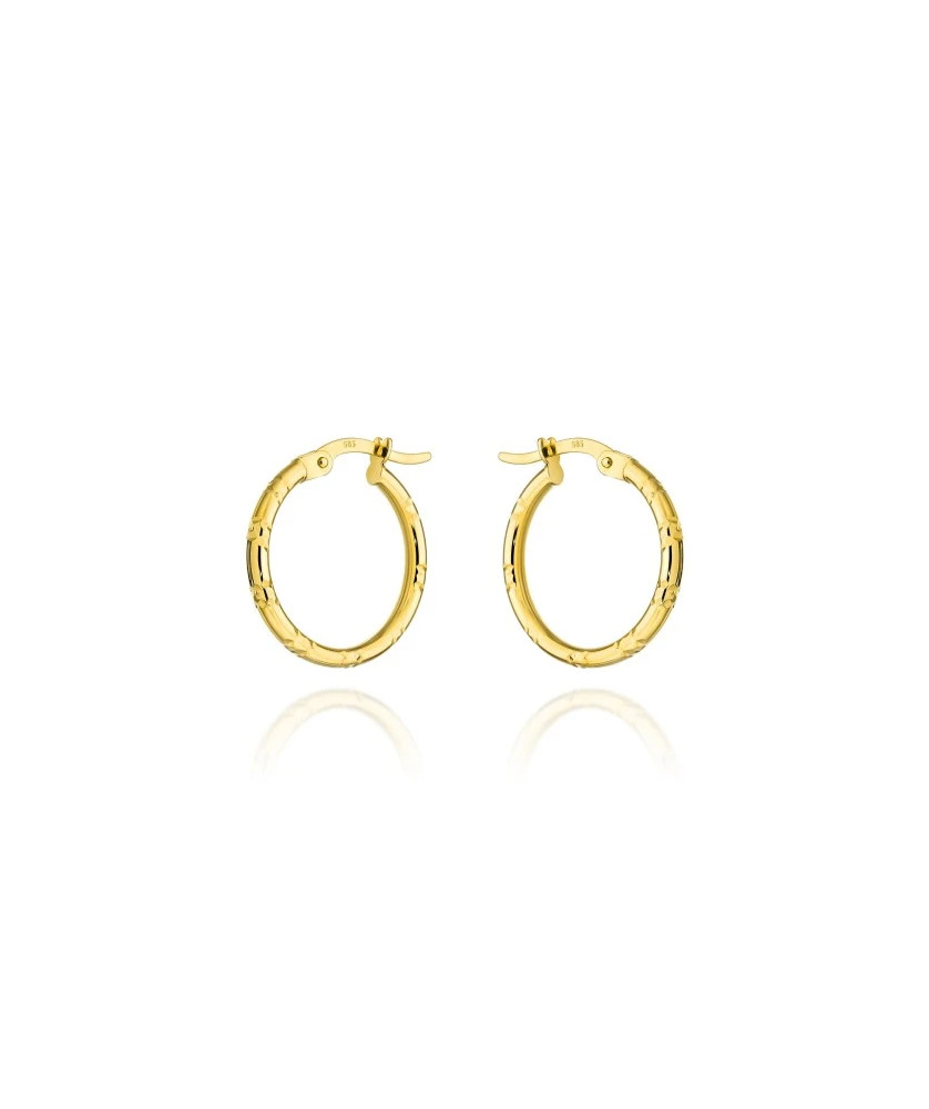 Gold hoop earrings with notches