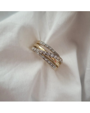 Wide gold ring with white stones