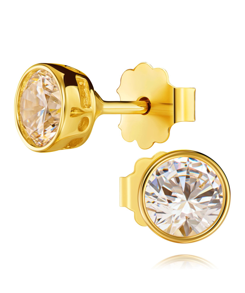 Delicate gold earrings with zirconia