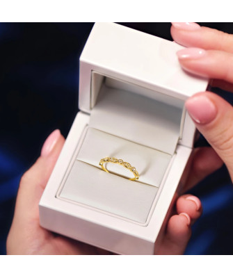 Delicate gold ring white stones