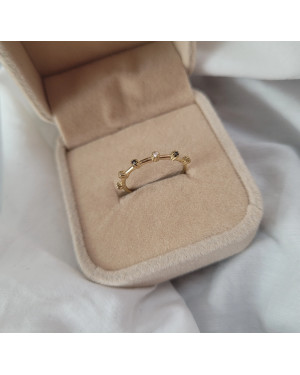 Gold ring with black and white zirconia