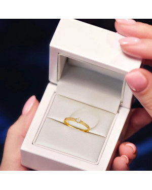 Delicate 14k engagement ring with cubic zirconia