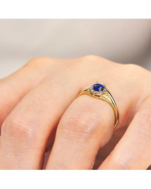 Ring with blue stone 14k