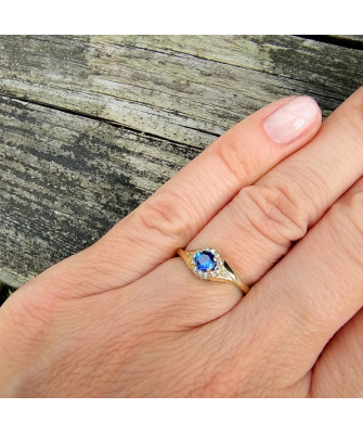 Ring with blue stone 14k
