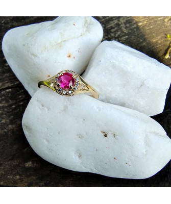 14k ring with red stone