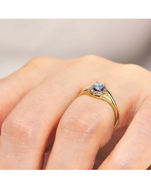 Ring with a blue stone 14k