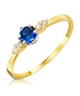 Gold ring with blue stone 14k