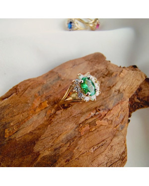 Engagement ring with green stone 14k