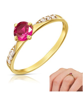 14k gold ring with red stone