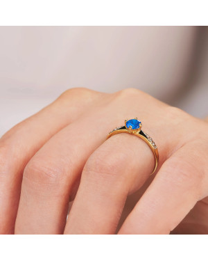 14k gold ring with blue stone
