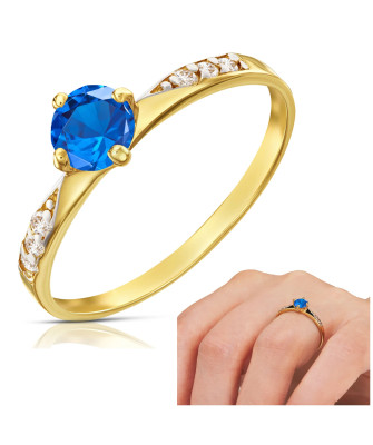 14k gold ring with blue stone