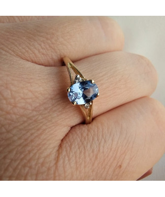 Gold ring with a blue marquise