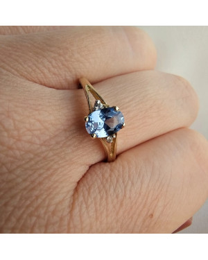 Gold ring with a blue marquise