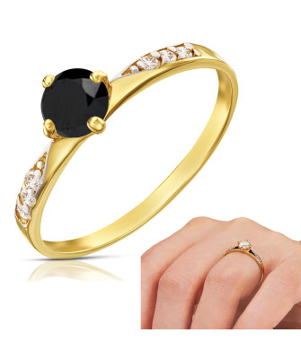 Gold engagement ring with black stone