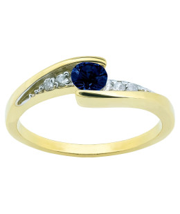 Delicate ring with a blue stone 8k