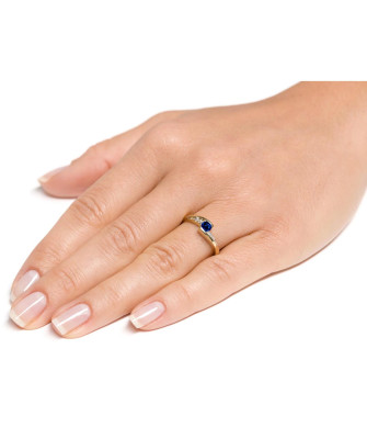 Delicate ring with a blue stone 8k