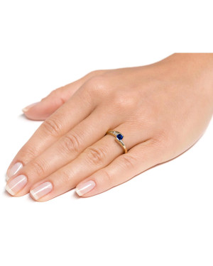 Delicate ring with a blue stone 8k