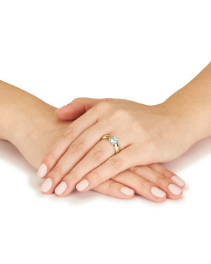 Gold ring with a large blue stone