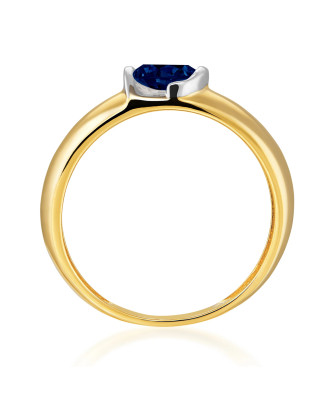 14k gold ring with a large sapphire stone