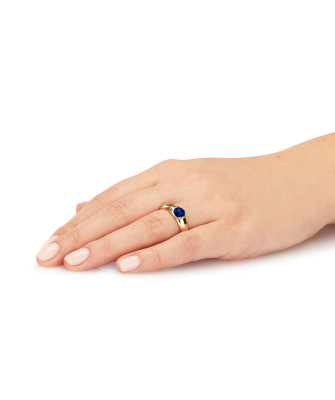 14k gold ring with a large sapphire stone