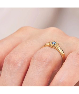 Golden flower ring 14k blue zirconia
