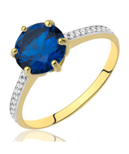 Blue stone in 14k gold ring