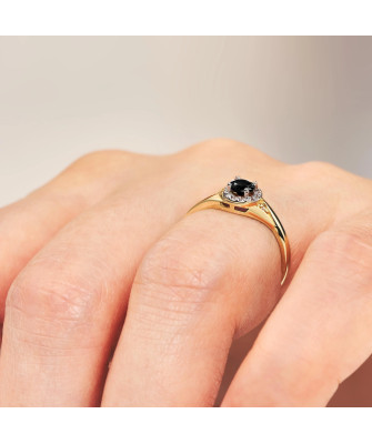 Ring with black stone gold 8k