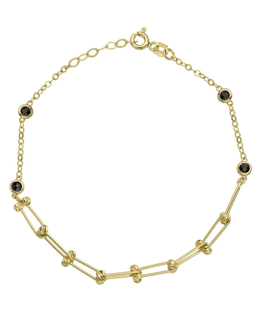 Bracelet with intertwined gold diamond-cut beads and black stones
