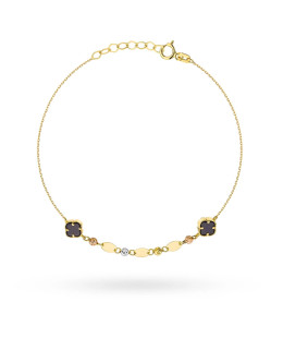 Bracelet with golden ovals, black clovers, and beads in three color...