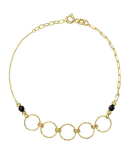 Gold diamond-cut rings and black stones bracelet