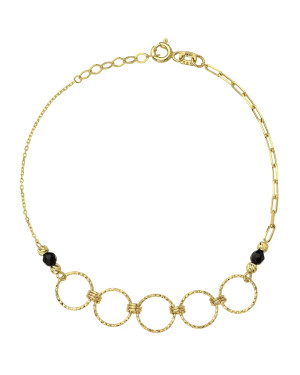 Gold diamond-cut rings and black stones bracelet