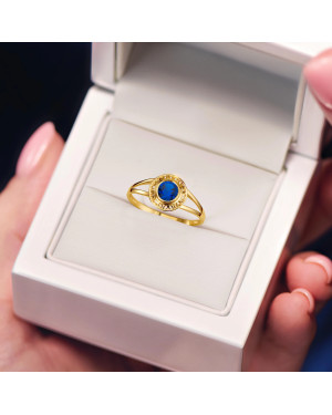 Gold filigree ring blue stone