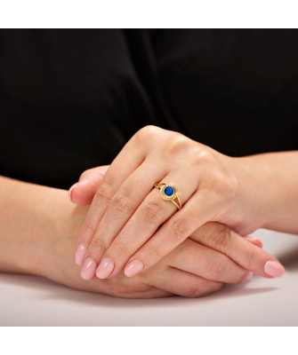 Gold filigree ring blue stone
