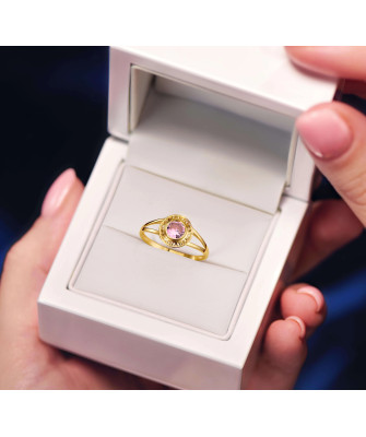 Lacy ring with pink stone