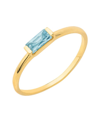 Delicate gold ring with a light blue stone