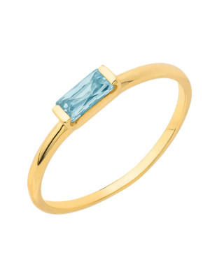 Delicate gold ring with a light blue stone