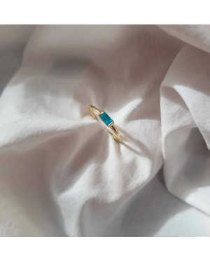 Delicate gold ring with turquoise stone