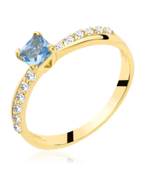 Gold engagement ring blue stone