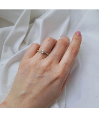 Gold engagement ring white stone