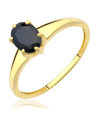 Gold ring with black oval stone