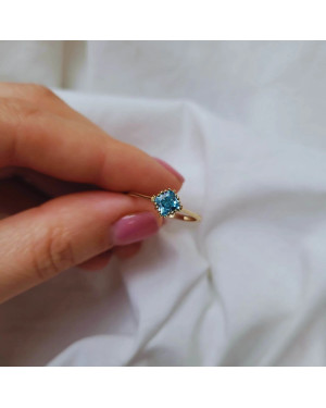 Gold ring blue stone