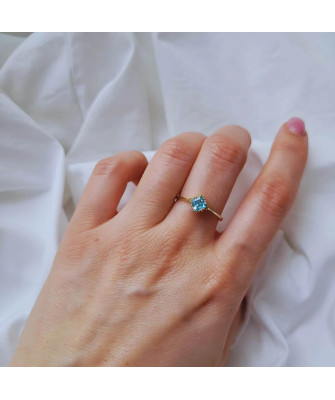 Gold ring blue stone