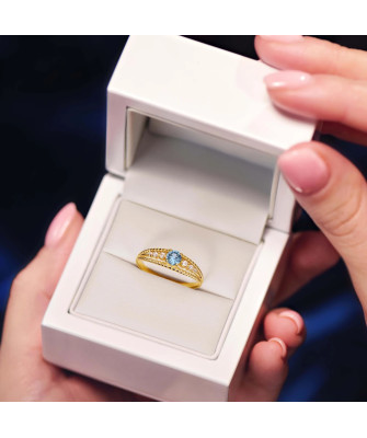 Ring with a blue stone 8k zirconia