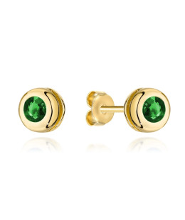 Gold earrings with a green stone surrounded by gold