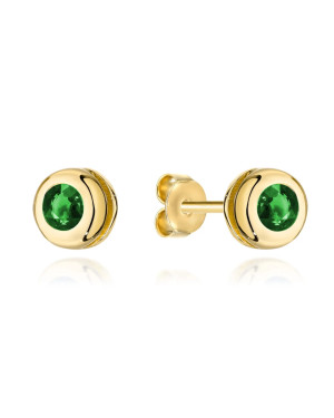 Gold earrings with a green stone surrounded by gold