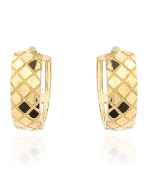 Gold earrings delicately decorated on a hoop