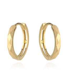 Gold diamond-cut hoop earrings on creole