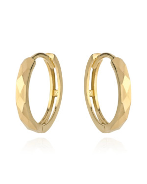 Gold diamond-cut hoop earrings on creole