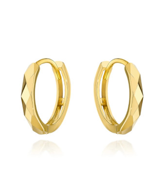 Gold diamond-cut hoop earrings on creole