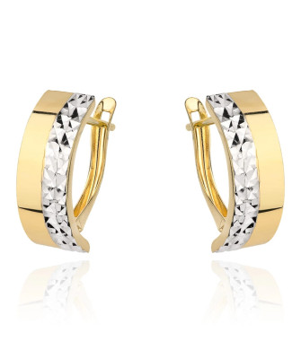 Gold earrings decorated with white gold and diamond cutting